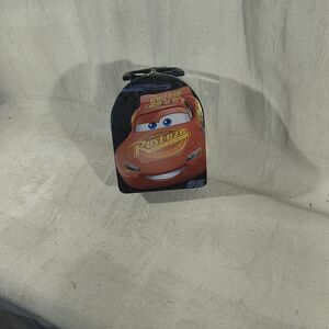 Metal lunch box featuring Lightening Mcqueen by Disney Pixar Cars